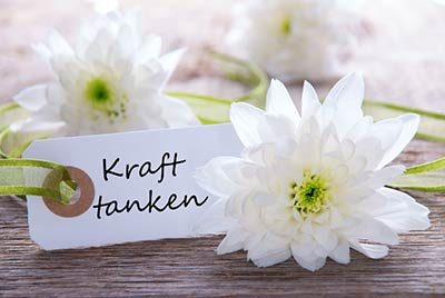 Karte mit dem Text "Kraft tanken"